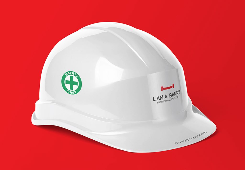 Liam A. Barry Engineering Supplies logo and "Safety First" sticker on a white hard hat